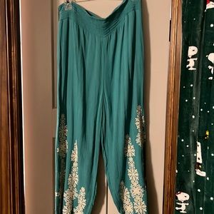 Sundance NWOT capri turquoise with glitter at the bottom.